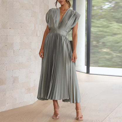 Britt - Elegante Bruiloft Gastenjurk Dames met Diepe V-hals en Geplooide Maxi-rok