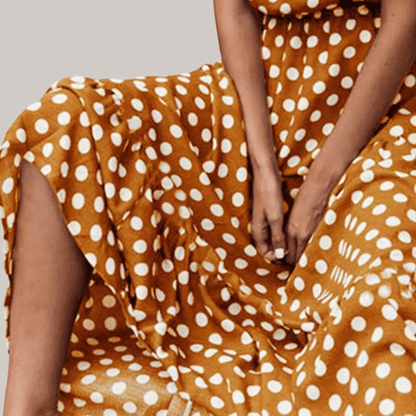 Britt - Vintage Maxi Jurk met Stippen Dames en Beensplit