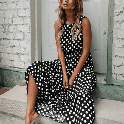 Britt - Vintage Maxi Jurk met Stippen Dames en Beensplit