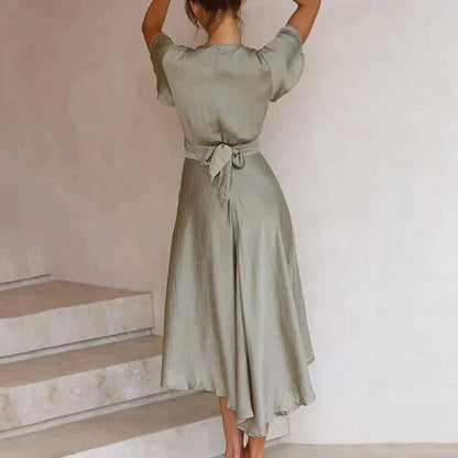 Sanne - Stijlvolle Midi Zomerjurk Dames met Diepe V-hals en Knoop Detail