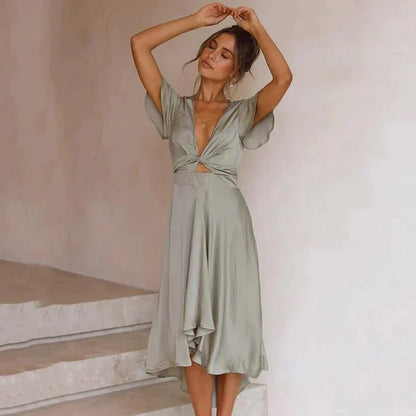 Sanne - Stijlvolle Midi Zomerjurk Dames met Diepe V-hals en Knoop Detail