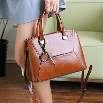 Tas Dames - Gestructureerde Handtas met Geometrisch Patroon en Bedeltje | Chic