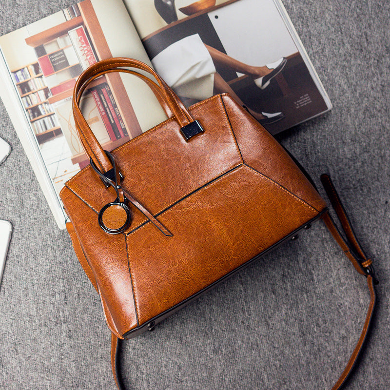Tas Dames - Gestructureerde Handtas met Geometrisch Patroon en Bedeltje | Chic